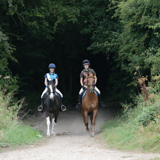 Two girls on a hack
