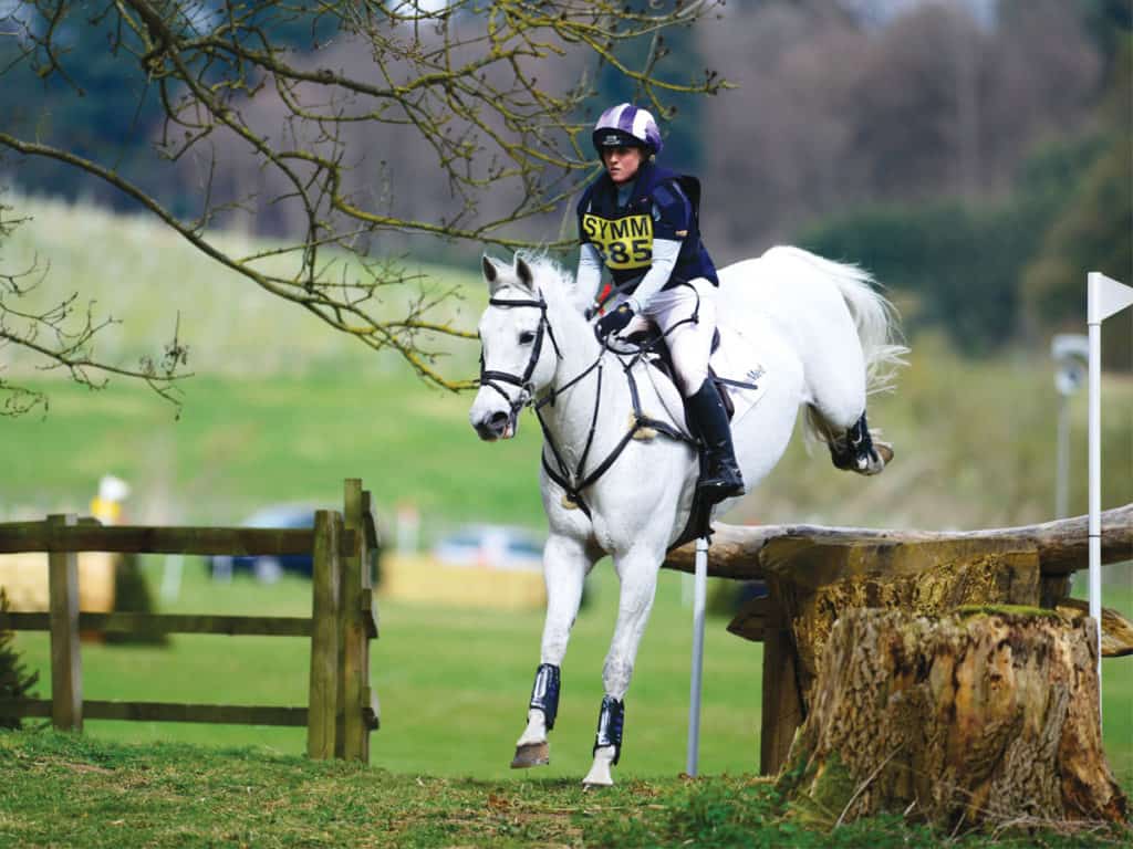 Rider jumping at a cross-country competition