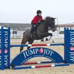 Pony Nuts having a jumping lesson with Ben Hobday