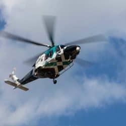 [Kent Surrey and Sussex Air Ambulance in action] Sussex Photographer / Shutterstock.com