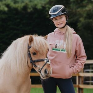 Harlow White in the Harlow Herd hoodie and Cloudy
